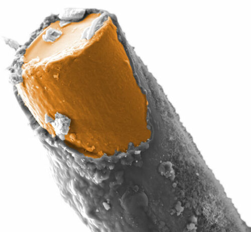 An aluminum-coated multi-filament yarn for electromagnetic shielding applications