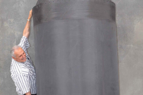 BHL Cryotank held by Zachary Taylor, Vice President of Engineering at GTL
