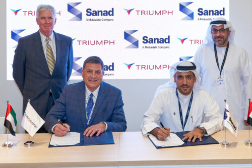 Front (right to left): Mansoor Janahi, Group CEO, Sanad; Jim Berberet, President of TRIUMPH Product Support Back (right to left): Badr Al Olama, Executive Director - UAE Clusters, Mubadala Investment Company; Daniel J. Crowley, Chairman, President, and Chief Executive Officer