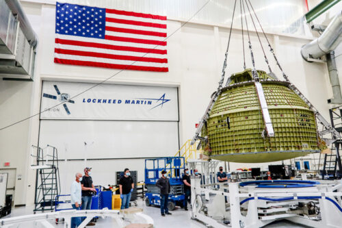 The Orion crew module pressure vessel for the Artemis III mission—the first vehicle under the Lockheed Martin OPOC contract—is undergoing assembly at NASA’s Kennedy Space Center.