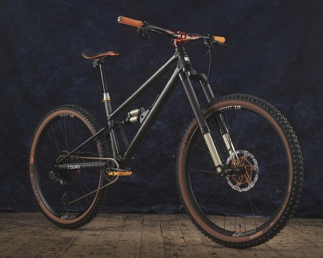 CompoTech PLUS showcasing its latest Enduro racing mountain bike with innovative new carbon fibre suspension forks