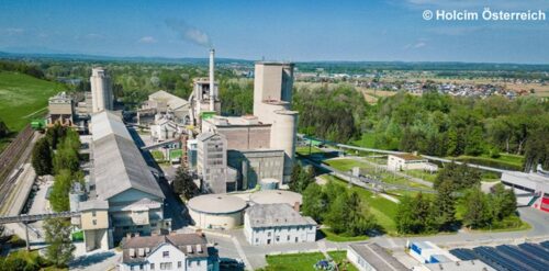 Cement co-processing of end-of-life composites