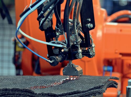 Olin -- Wet pressing of a recycled carbon fibre mat -- courtesy of Cannon